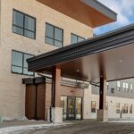 Modern building entrance with overhang